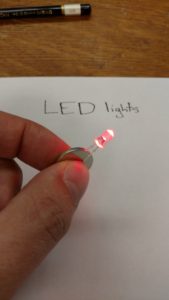 LED light attached to battery.